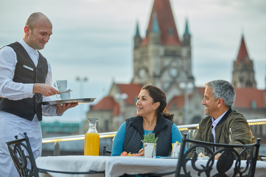 Couple wearing layers on a Danube River cruise