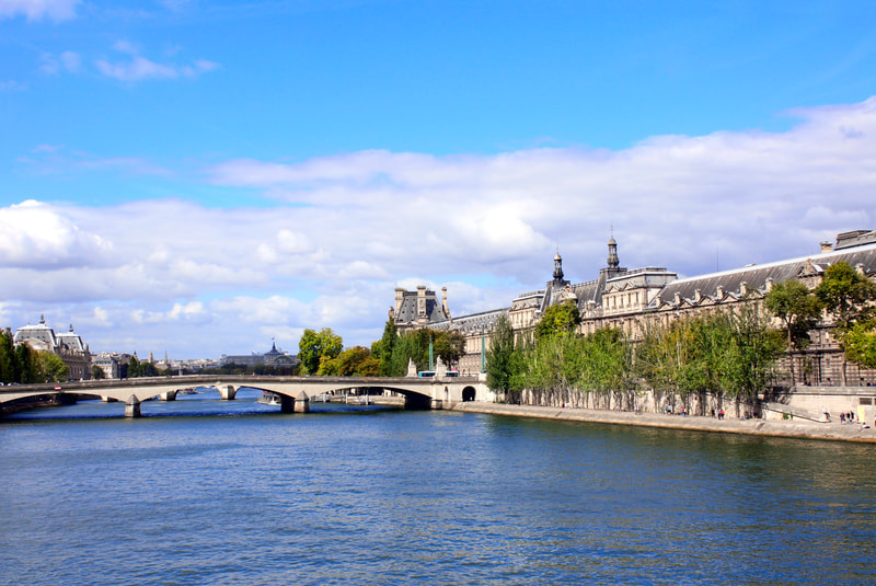 Louvre Museum from the Seine River Paris