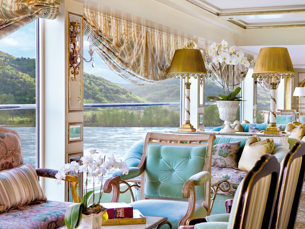 Uniworld cruise ship lounge looks over Rhine River